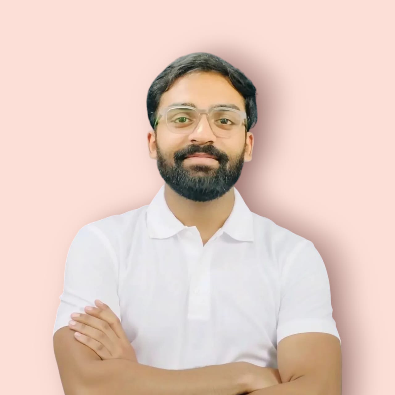 Smiling man wearing glasses and a white shirt on a pink background.