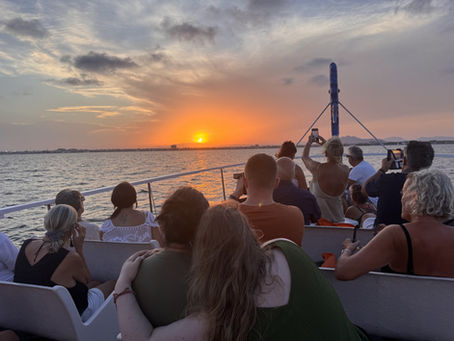 Guests aboard a Just Stargaze cruise watch the 2026 solar eclipse over the Mar Menor