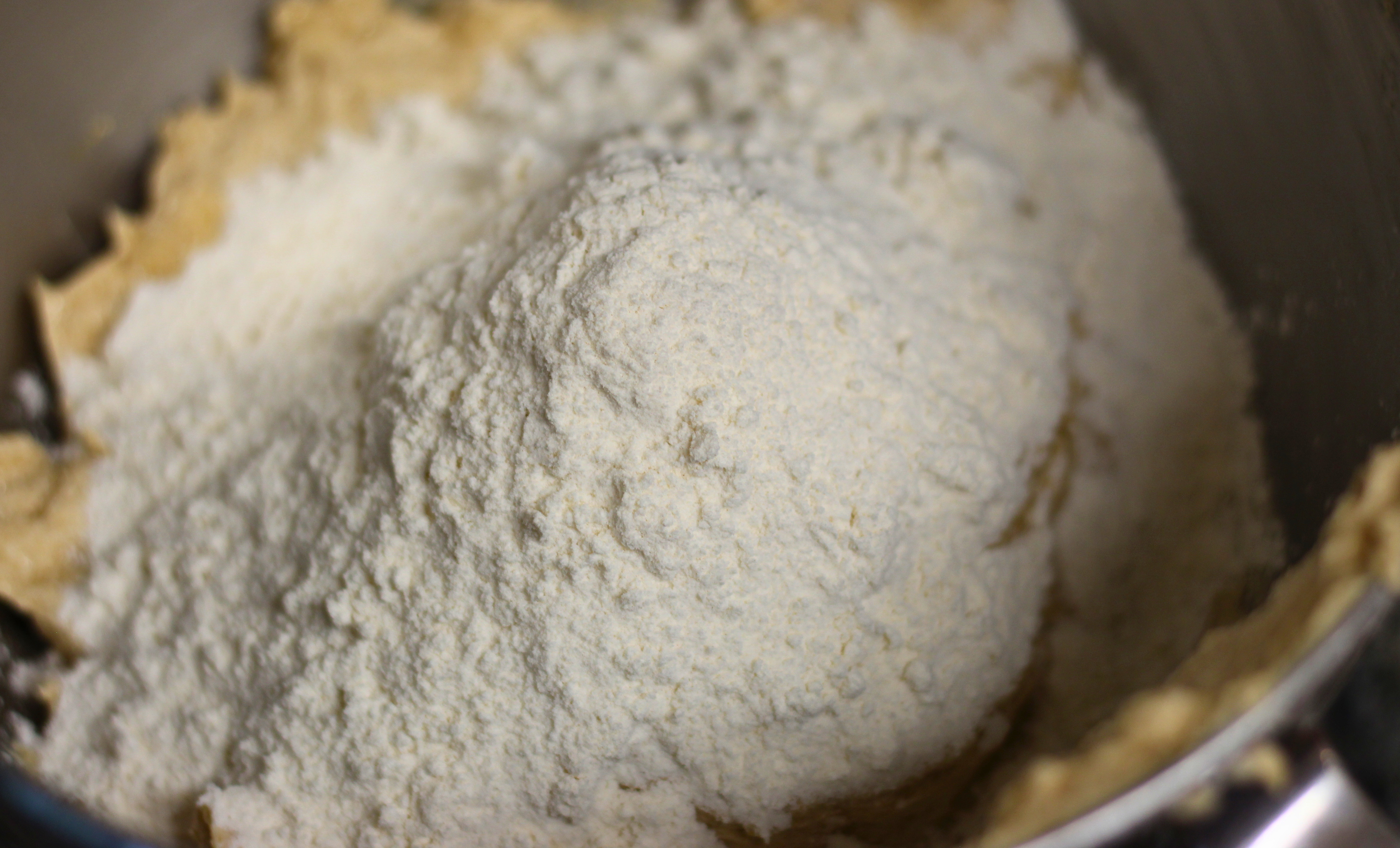 Flour on top of cookie dough.