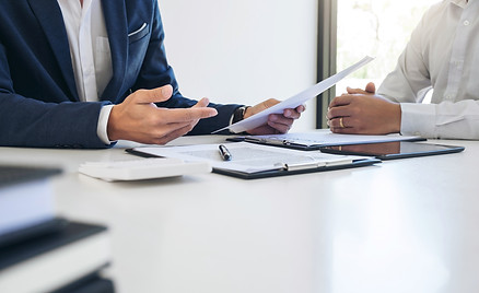 Agent man presentation and consulting car insurance detail to customer and waiting for his
