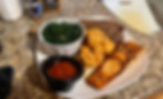 Southern soul food plate with grilled salmon, steak, collard greens, and fried sides served at Double’s BBQ & Soul Food Exper