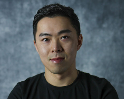 Headshot of an Asian man
