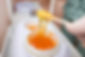 master-sugar-hair-removal-winds-epilation-paste-onto-spatula-close-up.jpg