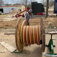 Big spool of wire on a new development site