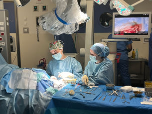 First robotic insertion of a perimodilar cochlear implant in a child and an adult