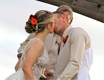 Bride and groom kissing