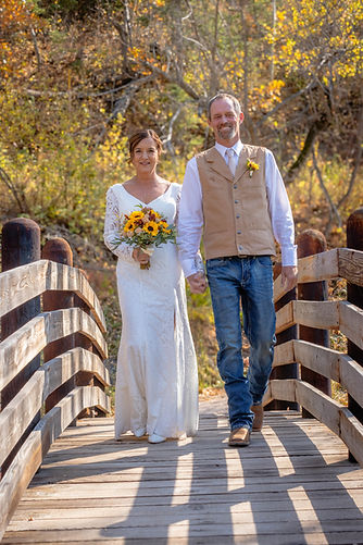 Bride and groom walking.jpg