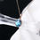 Miniature : Collier avec pendentif en or rose 18 carats et topaze bleue naturelle de 2,87 ct avec logo personnalisé