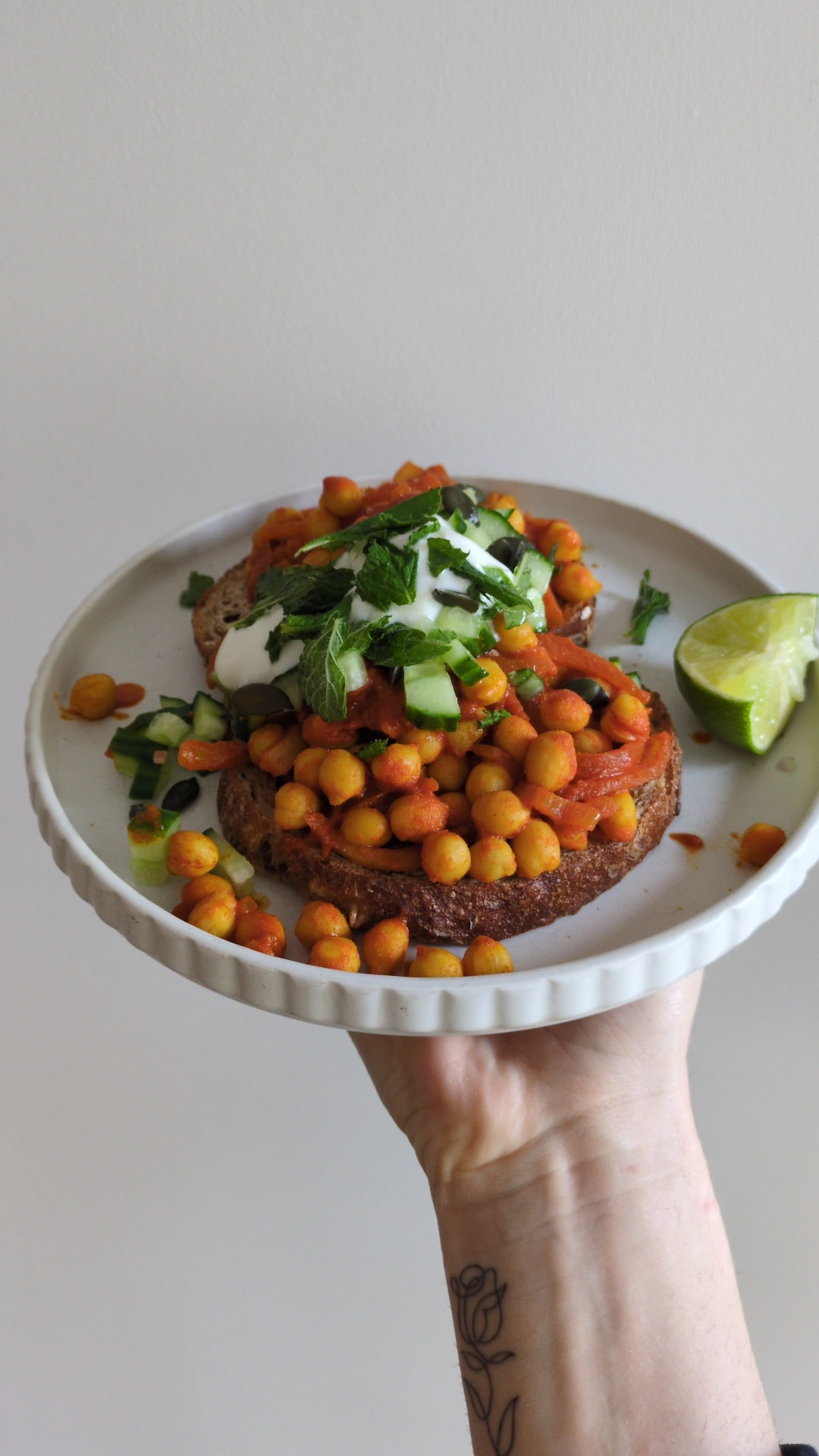 Harissa chickpeas on sourdough with yoghurt, cucumber and mint, a high-protein breakfast for blood sugar balance.