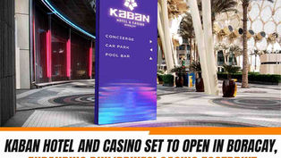 Purple directional sign for Kaban Hotel & Casino Boracay with news graphic text announcing its opening and expansion of the Philippines casino industry.