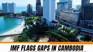 Aerial view of high-rise hotels and casino buildings along the coastline and beach in Sihanoukville, Cambodia.