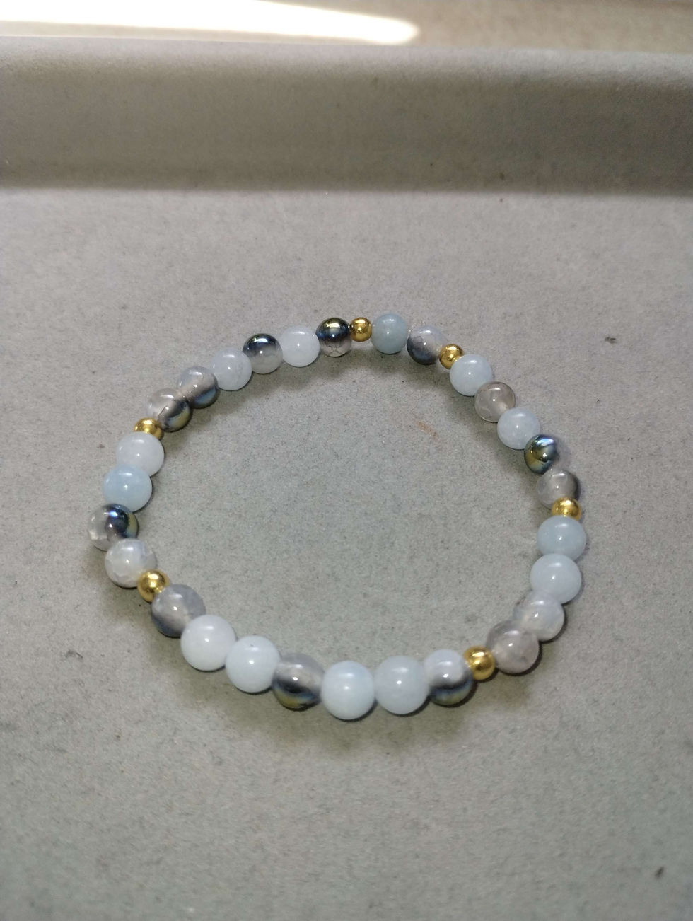 light blue and gray bead bracelet