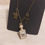 Thumbnail: Women's  bronze chain with turtle, perfume bottle and cross charm necklace 