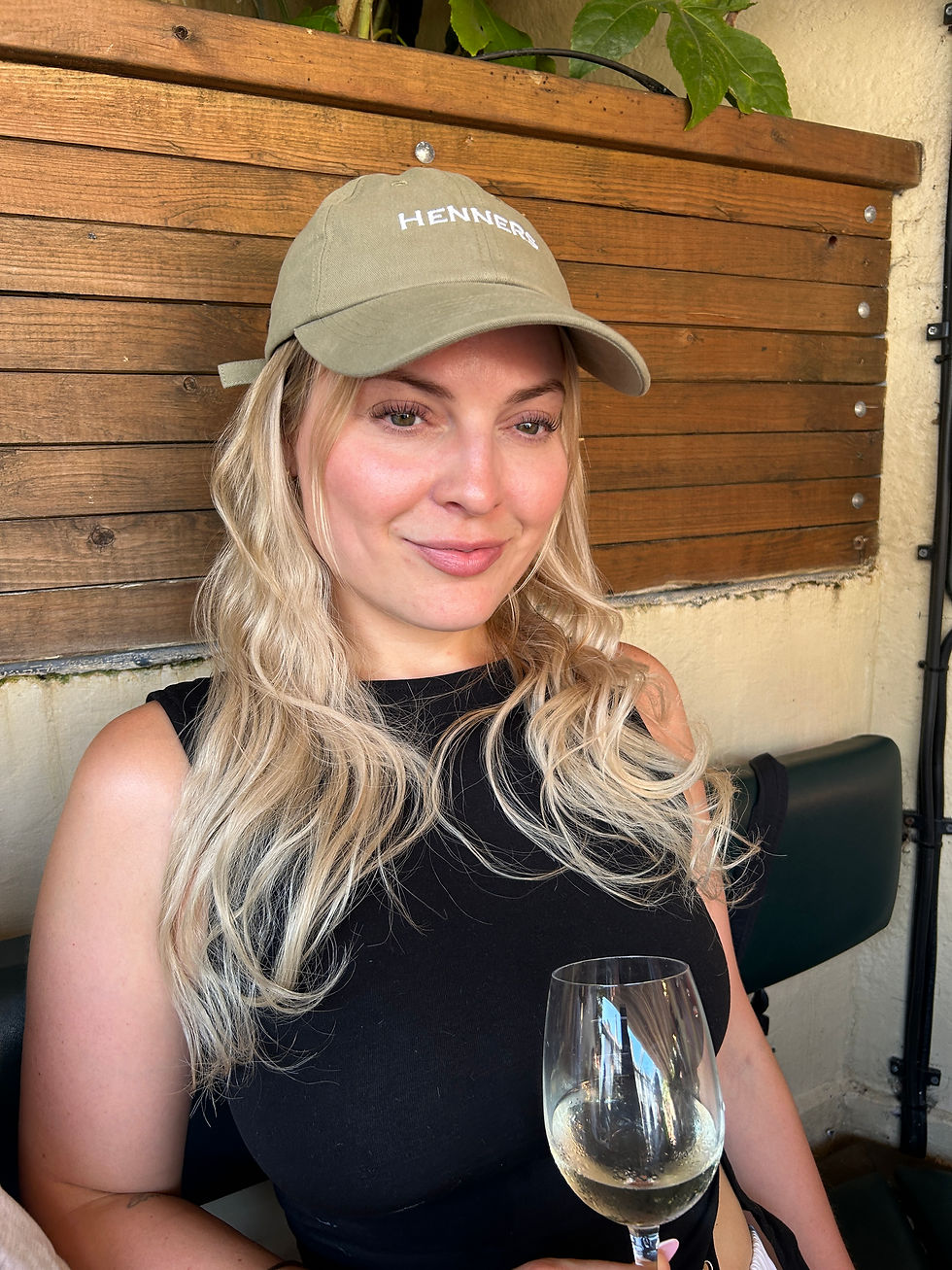 Henners 6 panel cap on model