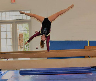 Gymnist on the balance beam