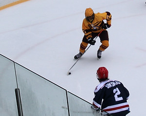 Students playing ice hockey