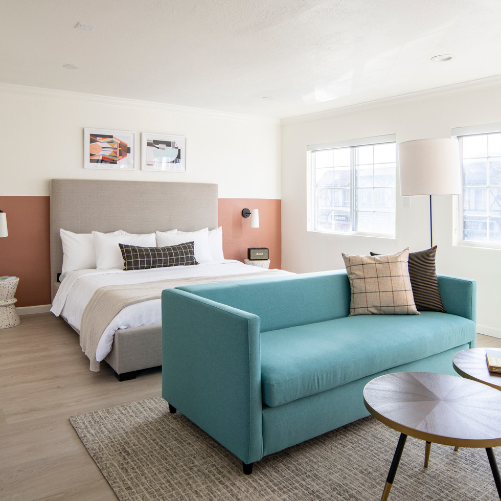 Mid Century motel room bright colored mid century bedroom retro bedroom teal sofa Broadway Motel Oakland 