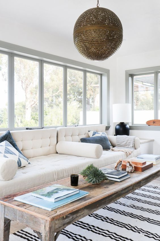 Stripe vintage rug reclaimed wood coffee table beach house