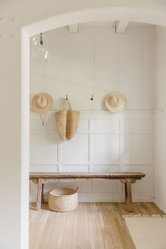Jenni Kayne entry, reclaimed wood bench entry, hats hung on wall