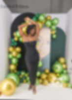 Woman standing in magazine photo box