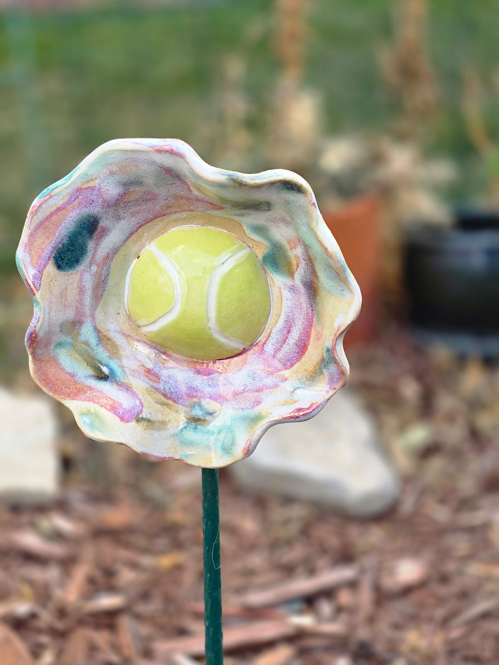 Thumbnail: Tennis Buds — garden art