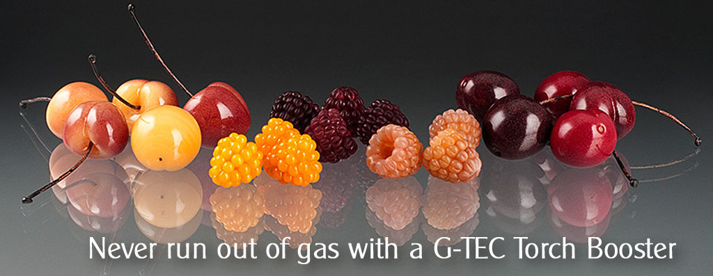 Natural gas torch boosters for glass lampwork