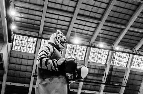 A person wears a costume of a tiger, which is the official mascot of the 3rd Asian Savate Championship hosted in Mirpur Indoor Stadium, Dhaka, Bangladesh on January 12, 2022. In 2022, Bangladesh hosted the Asian Savate Championship for the first time.