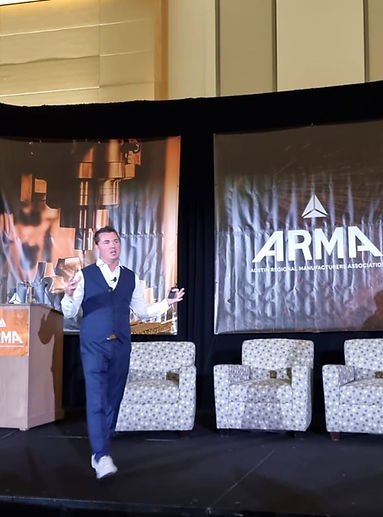 Tony Gunn at a manufacturing event in Texas meeting industry professionals