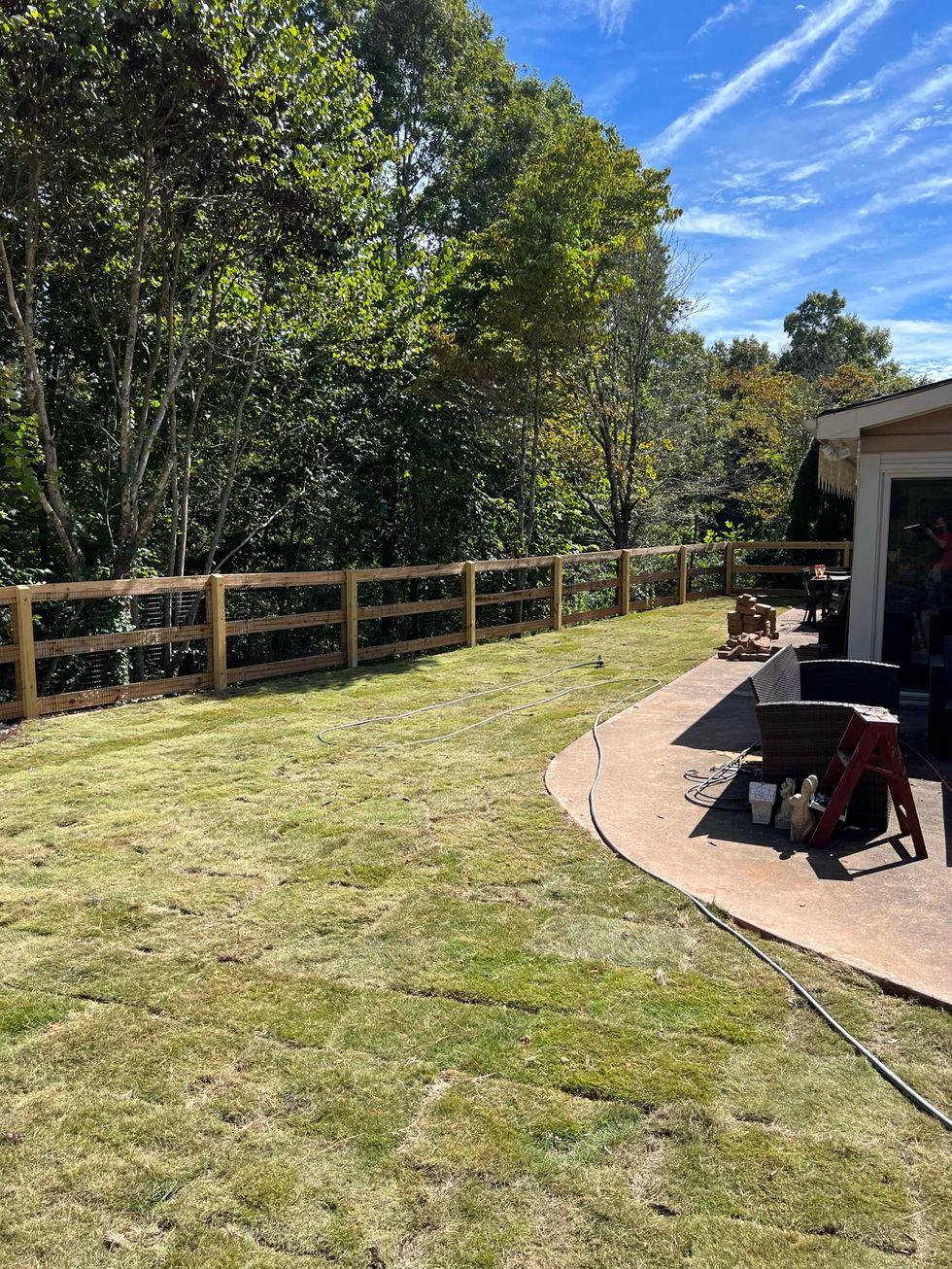 Backyard landscape design and total makeover, sod installation with decorative stone patio and fire pit