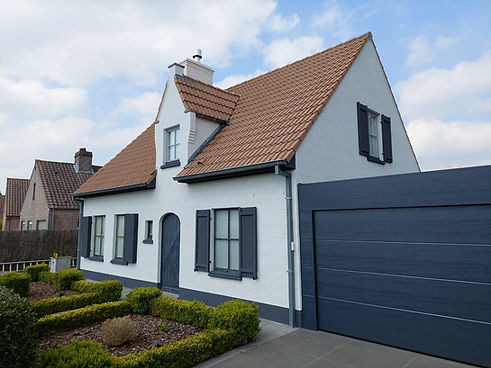 spuitkurk gevelafwerking woning in Vlaanderen