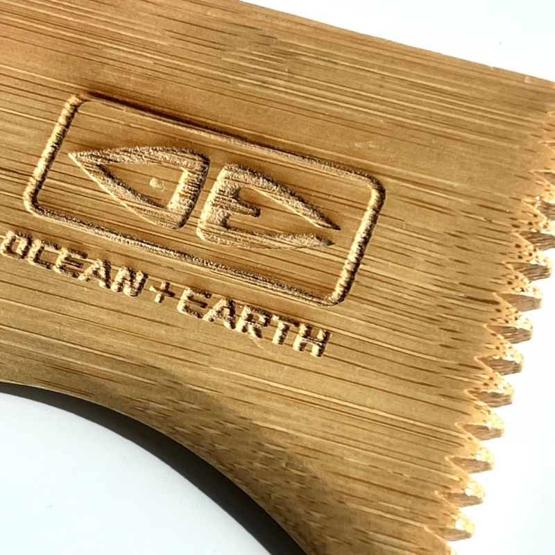 Eco Friendly Bamboo Wax Comb with Leash String Close Up