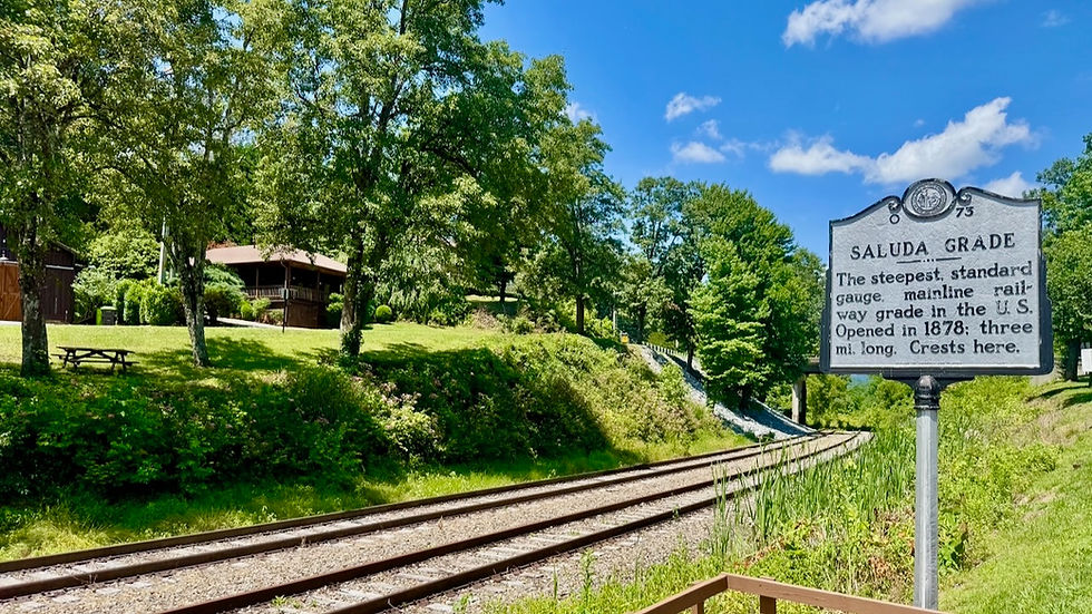 Saluda Grade historical marker by the railroad tracks