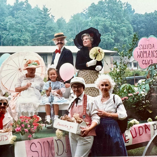 Saluda Woman's Club members on a vintage parade float.