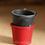 Thumbnail: A black bucket stacked inside a red bucket.