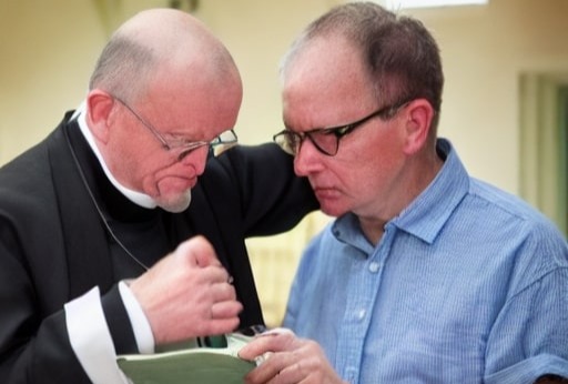 two man with eye glasses