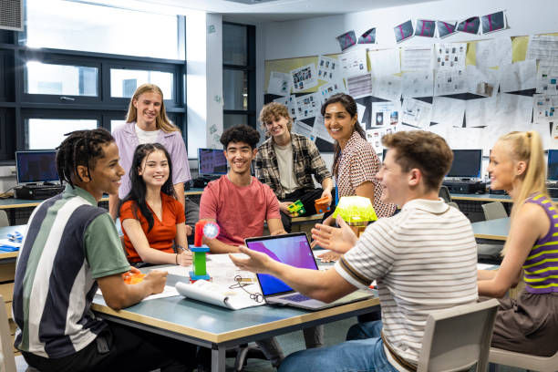 group of students and their teacher gathered around a table