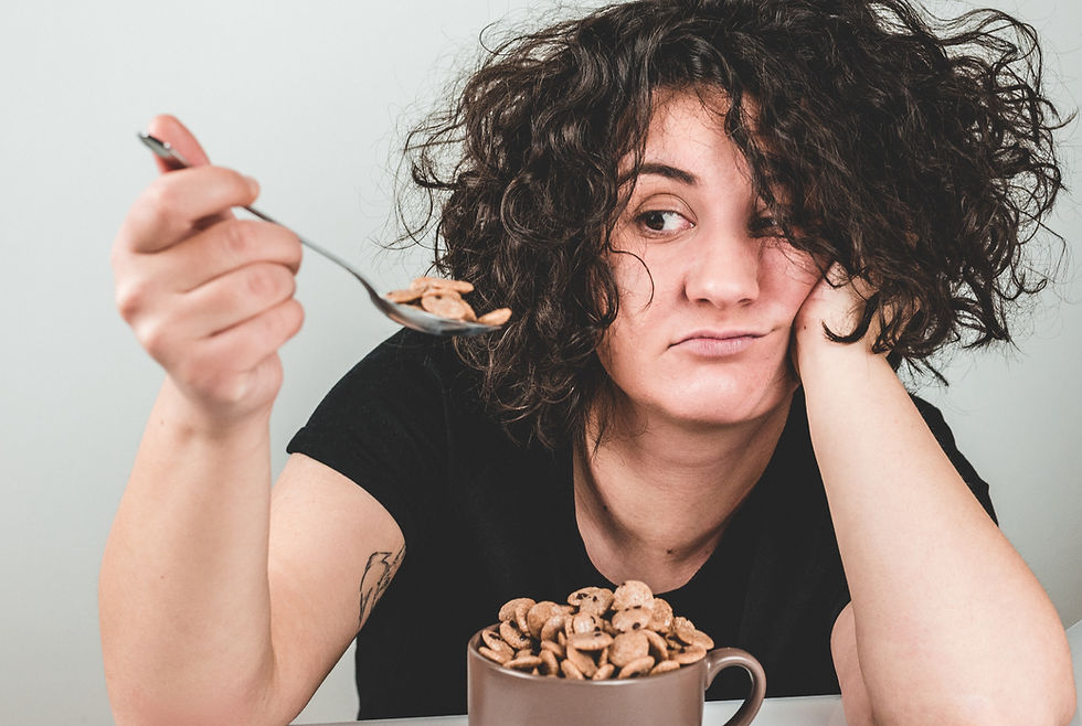 woman not in mood for eating cereal