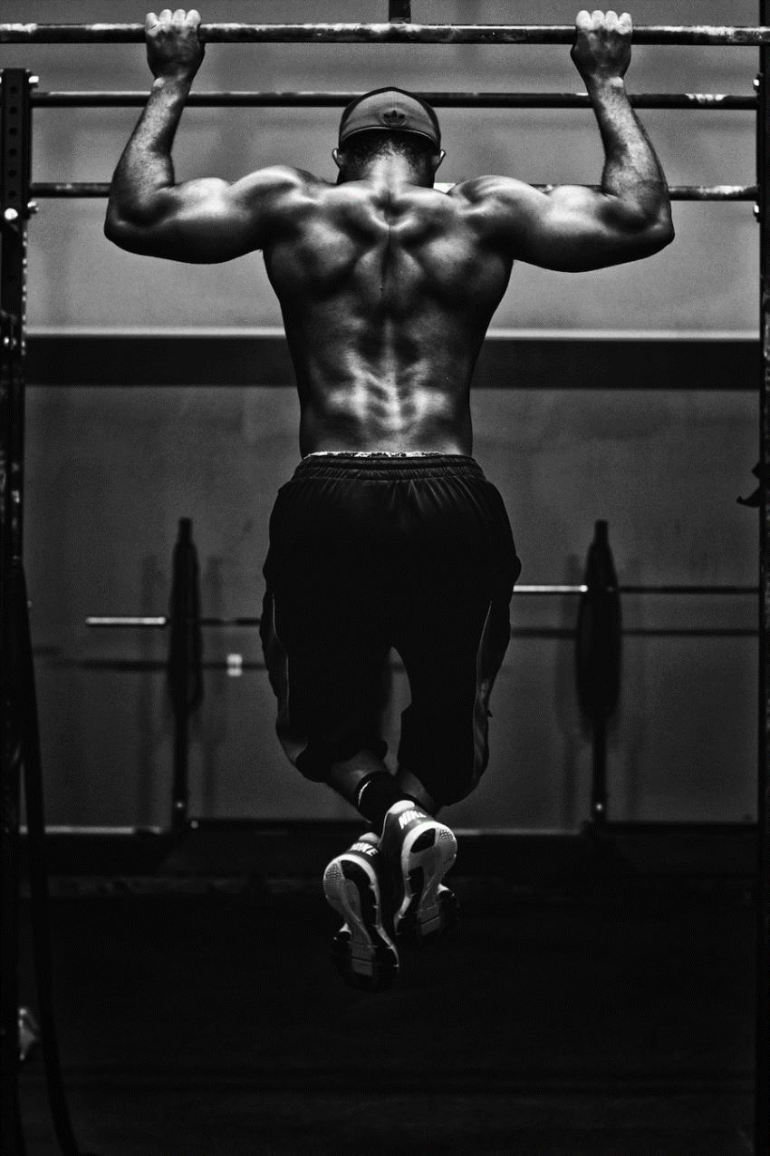 man on monkey bar