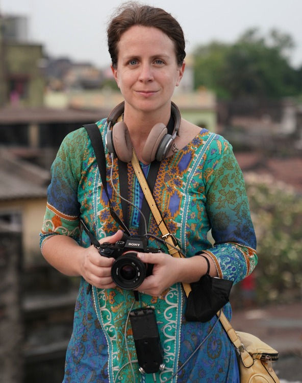 A woman with a camera.