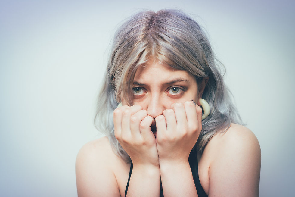 scared woman looking at the camera