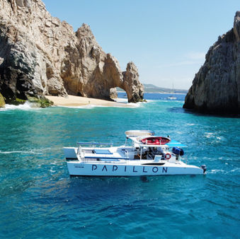 The arch of Cabo San Lucas with catamaran