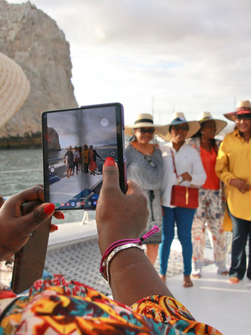 taking a photo on board the private catamaran in cabo papillon 3 