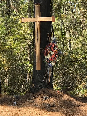 The Cross on Travis' crashsite tree in honor of him