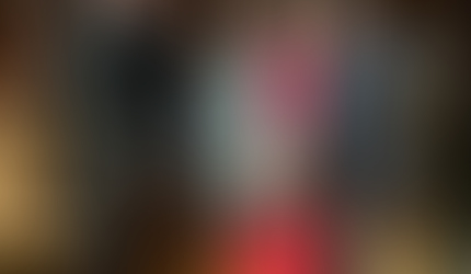 Group of five attendees posing together in Foundation House's wood-paneled room during Food Security for Fairfield County gathering