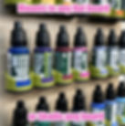 Paint magazine from 3D printable paint rack mounted on oak board with bottles inserted