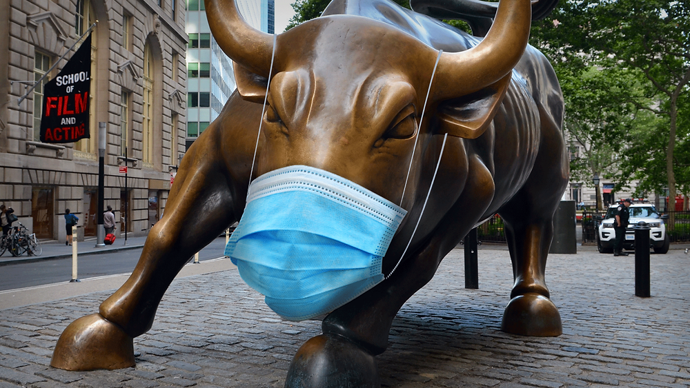 Photo of a stock market bull wearing a coronavirus face mask
