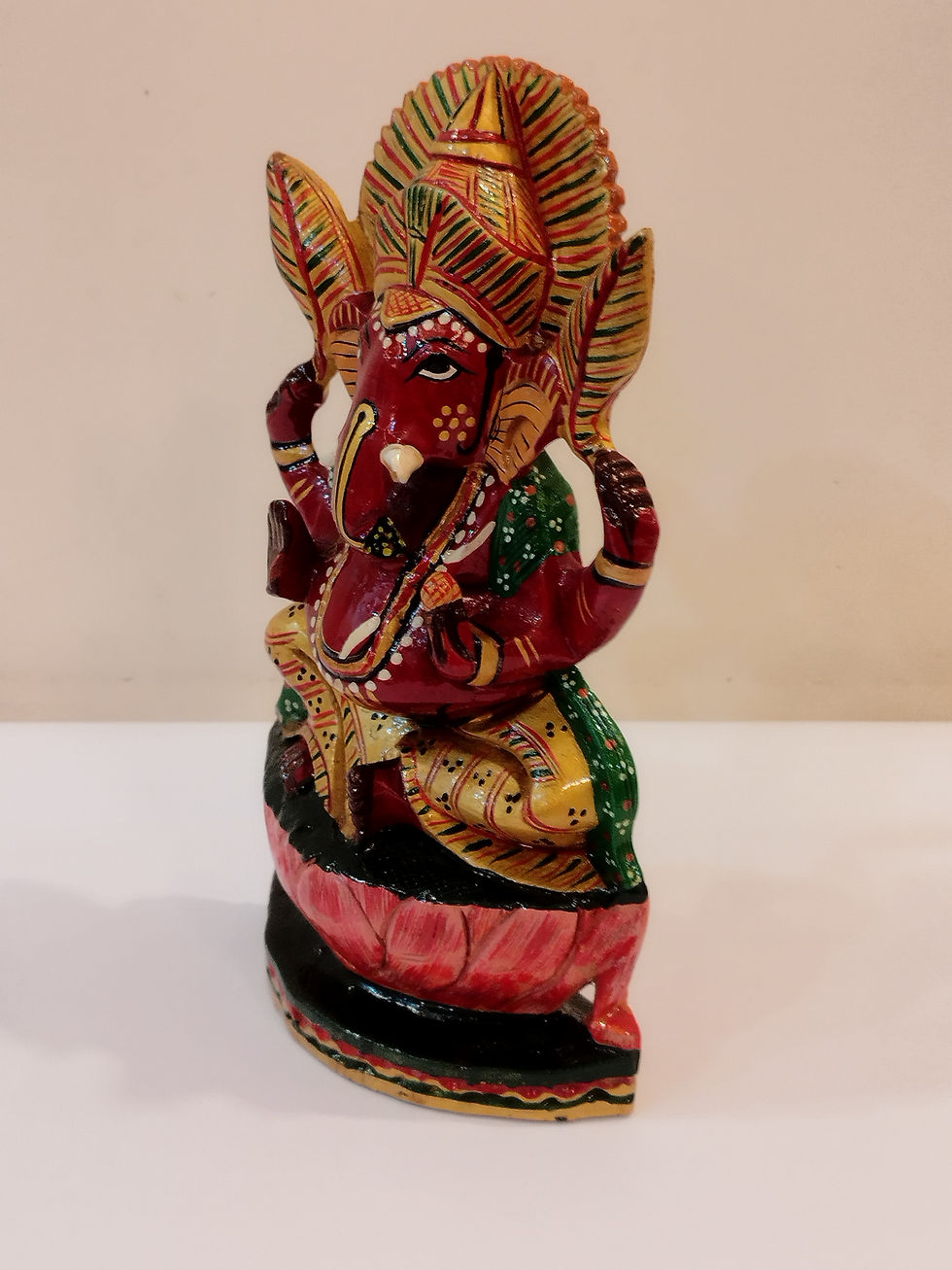 Thumbnail: Hindu deity Vinayak, a handcrafted Kadam Wood Painted Ganesha Statue with Chatar