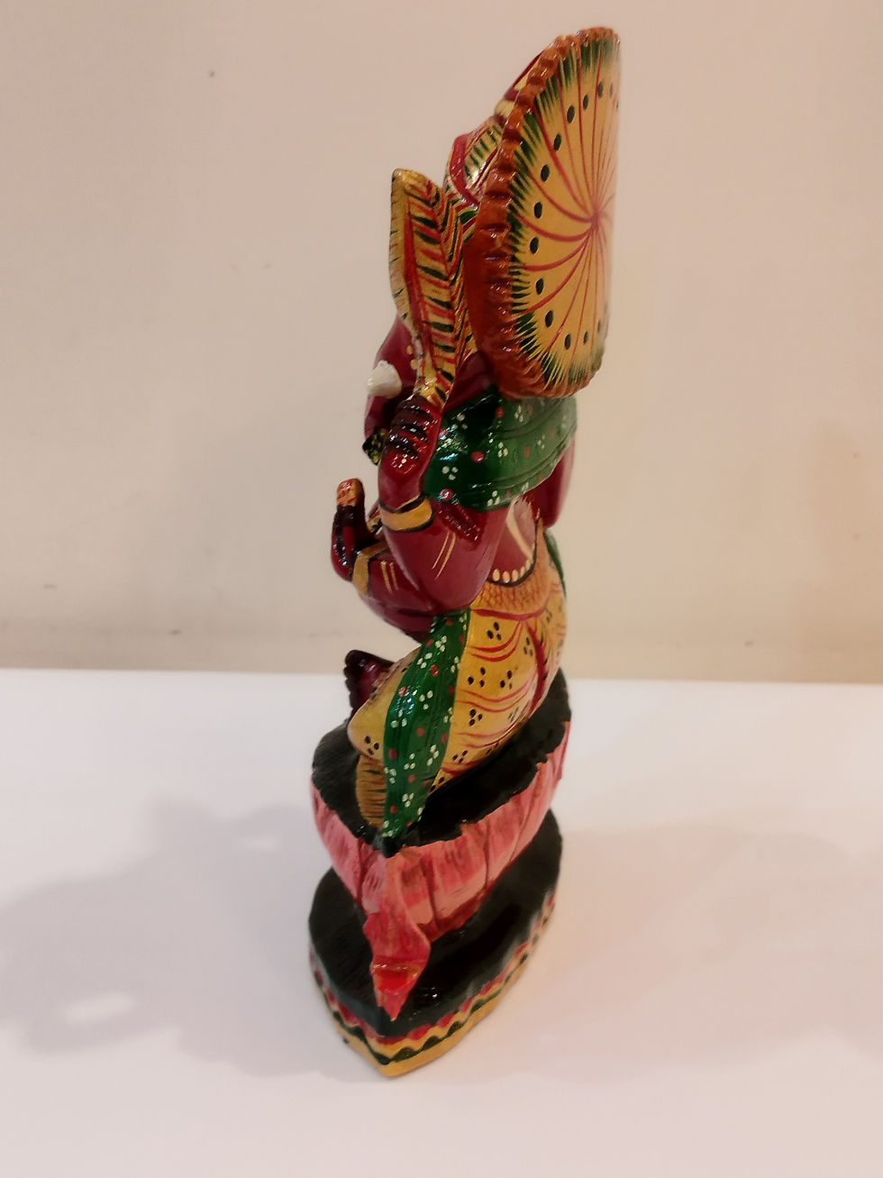 Thumbnail: Hindu deity Vinayak, a handcrafted Kadam Wood Painted Ganesha Statue with Chatar