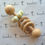 Thumbnail: Wooden rattle teether with added silicone beads