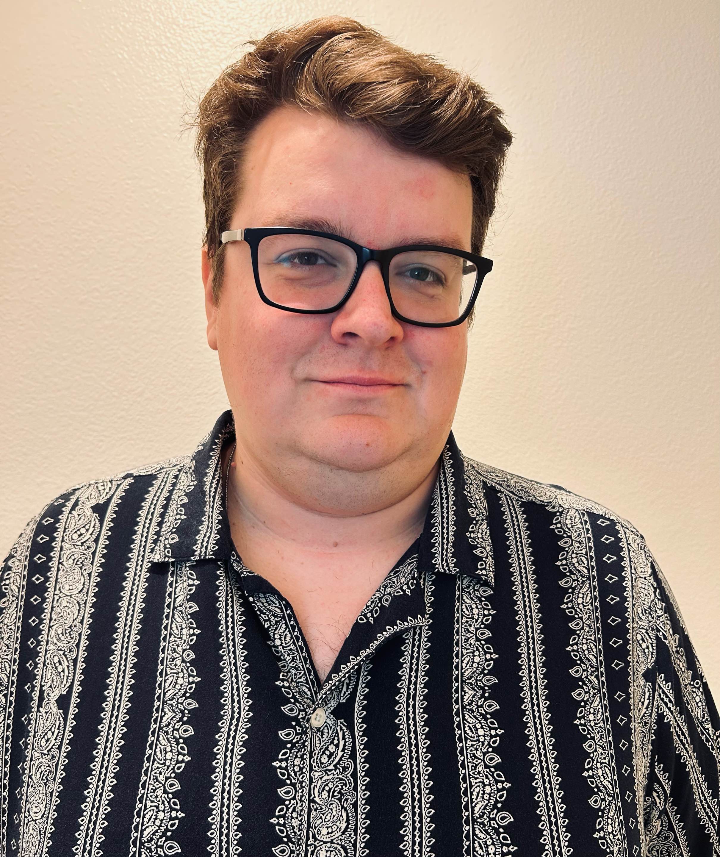 Professional headshot of a Leadership instructor.